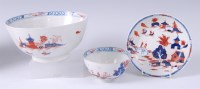 Lot 1053 - A Lowestoft porcelain tea bowl on stand,...