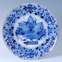 Lot 1057 - An 18th century English Delft pottery plate,...