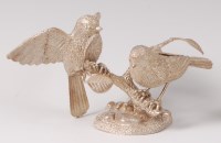 Lot 1074 - A contemporary sculpted silver table ornament...