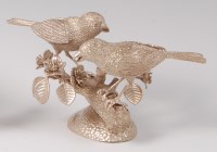 Lot 1075 - A contemporary sculpted silver table ornament...