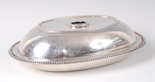Lot 1077 - A George III silver entree dish and cover,...