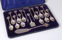 Lot 1102 - A cased set of twelve silver teaspoons with...