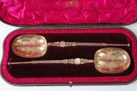 Lot 1103 - A cased pair of late Victorian silver gilt...