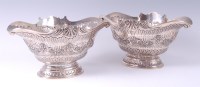 Lot 1105 - A pair of late Victorian silver basket table...