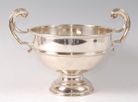 Lot 1107 - A silver pedestal rose bowl, having twin...