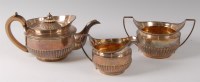 Lot 1110 - A George III silver three-piece tea service,...