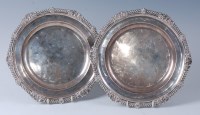 Lot 1113 - A pair of George III and later silver plates,...