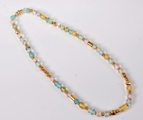 Lot 1127 - A multi-bead necklace, the multi gemstone...