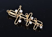 Lot 1132 - A contemporary diamond pendant/brooch, the...