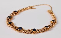 Lot 1139 - A sapphire bracelet, the seven round sapphires,...