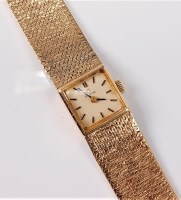 Lot 1164 - A lady's 9ct Omega wristwatch, the square dial,...