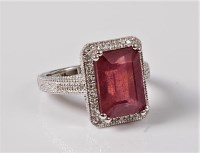Lot 1170 - A treated ruby and diamond ring, the emerald...