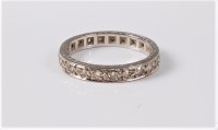 Lot 1176 - An 18ct full hoop diamond eternity ring, the...