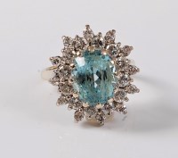 Lot 1180 - An aquamarine and diamond ring, the oval...