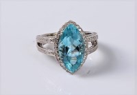 Lot 1181 - An 18ct aquamarine and diamond ring, the...