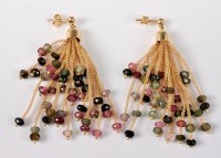 Lot 1189 - A pair of 18ct tourmaline tassel earrings, the...