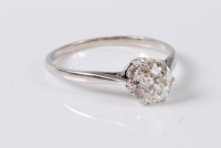 Lot 1219 - A diamond solitaire ring, the old round...