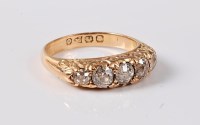 Lot 1222 - An 18ct five stone diamond ring, the five...