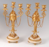 Lot 1252 - A pair of circa 1900 gilt bronze and white...