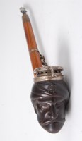 Lot 1267 - A mid-19th century German pipe, the brown...