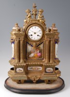 Lot 1428 - A 19th century French gilt bronze mantel clock...