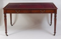 Lot 1436 - A Victorian mahogany library table, having a...