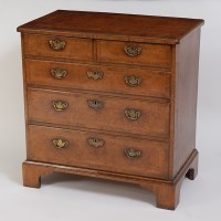 Lot 1439 - A walnut and burr walnut chest, in the early...