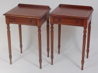 Lot 1447 - A pair of Regency style walnut lamp tables,...