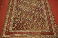 Lot 1450 - A Persian woollen Afshar rug, the blue ground...