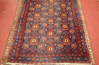 Lot 1451 - A Persian woollen Afshar rug, the blue ground...