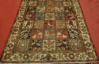 Lot 1456 - A Persian woollen Baktiari carpet, having five...