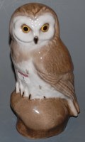 Lot 9 - A Proletary Russian porcelain model of an owl...