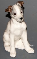 Lot 10 - A Konakova Russian porcelain model of a dog in...