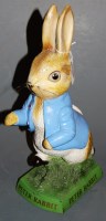 Lot 85 - A hollow cast resin figure of Peter Rabbit,...