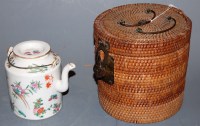 Lot 90 - A Chinese glazed stoneware teapot in wicker case