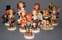 Lot 220 - Eight various Hummel figures, to include...