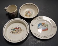 Lot 224 - A Wedgwood childs Peter Rabbit four-piece...