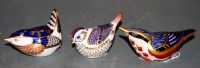 Lot 229 - Three various Royal Crown Derby bird desk...