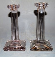 Lot 243 - A pair of moulded glass candlesticks