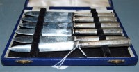 Lot 251 - A cased set of six silver handled dessert knives
