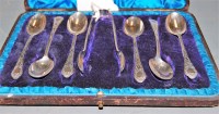 Lot 259 - A cased set of six silver teaspoons with sugar...