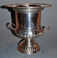 Lot 268 - A reproduction silver plated pedestal wine...