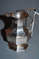 Lot 280 - An Art Deco silver cream jug, of octagonal...