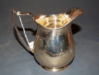 Lot 283 - A George V silver cream jug, 4.7oz, London...
