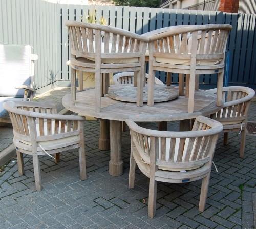 Lot 1166 - A contemporary teak garden suite by Lindsey,...