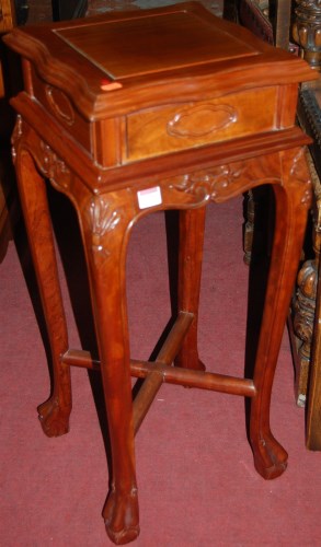 Lot 1332 - A contemporary Chinese hardwood urn stand,...