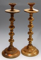Lot 14 - A pair of large turned brass table...
