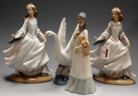 Lot 32 - A Lladro porcelain model of a girl in standing...
