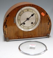 Lot 92 - An Art Deco walnut cased mantel clock, having...