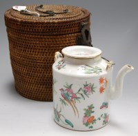 Lot 99 - A Chinese glazed stoneware teapot in wicker case